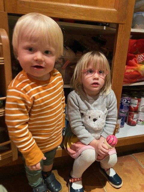 Cara sitting in the kitchen
