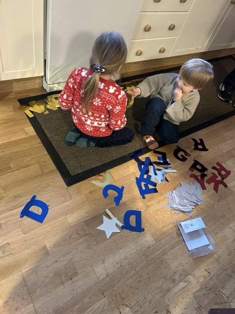 Cara playing with foam letters