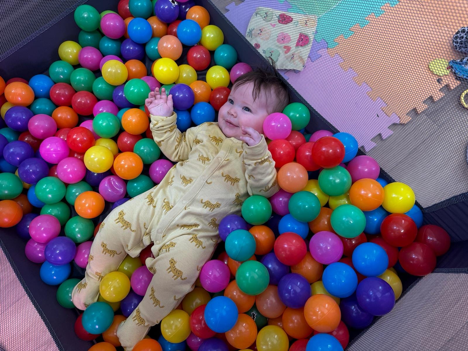 Eliza in the ball pit