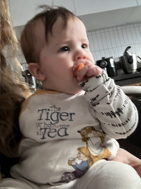 Eliza having a snack