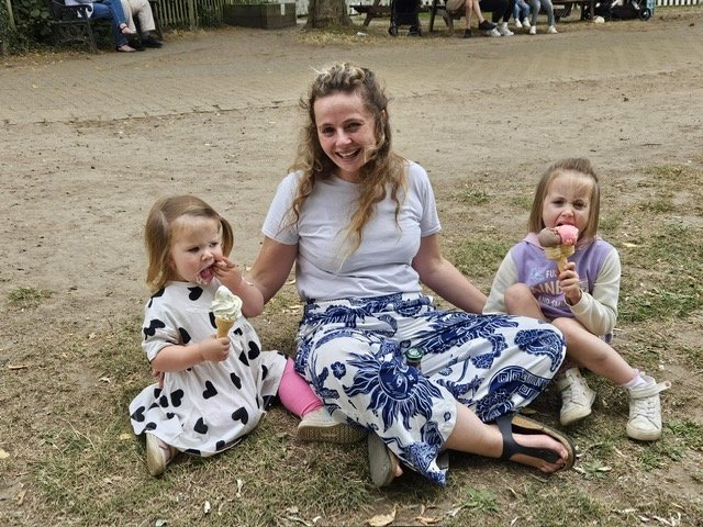 Cara, Eliza and Mummy eating ice cream in the park